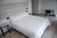 Posteľ alebo postele v izbe v ubytovaní Hotel Chips Fene
