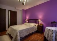 A bed or beds in a room at Paloma