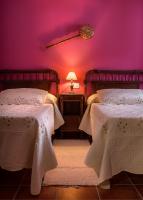 A bed or beds in a room at Paloma