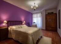 A bed or beds in a room at Paloma