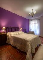 A bed or beds in a room at Paloma
