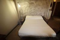 A bed or beds in a room at casa vacanze Castiglione - 4 posti letto
