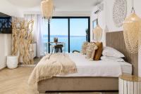 Posteľ alebo postele v izbe v ubytovaní Gallery Luxury Suites & Rooms-Only Adults