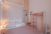 Łóżko lub łóżka w pokoju w obiekcie Approdo Rooms - Eja Sardinia