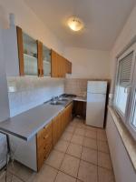 Kuchyň nebo kuchyňský kout v ubytování Apartment Bagić