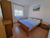 Postel nebo postele na pokoji v ubytování Apartment Bagić