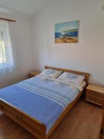 Postel nebo postele na pokoji v ubytování Apartment Bagić