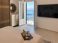 Telewizja i/lub zestaw kina domowego w obiekcie Portobello Boutique Hotel