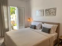 Łóżko lub łóżka w pokoju w obiekcie Portobello Boutique Hotel