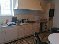 Kuchyňa alebo kuchynka v ubytovaní Chambre parentale chez l'habitant