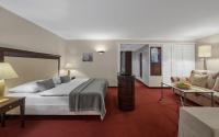 Posteľ alebo postele v izbe v ubytovaní Lebenberg Schlosshotel-Kitzbühel