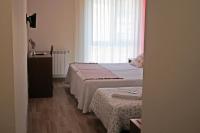 Postel nebo postele na pokoji v ubytování Villa de Colunga