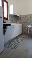 Kuchyňa alebo kuchynka v ubytovaní Holiday Home Tarinuzza