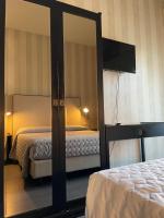 Łóżko lub łóżka w pokoju w obiekcie Hotel Vera