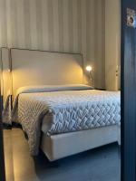 Łóżko lub łóżka w pokoju w obiekcie Hotel Vera