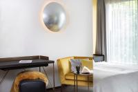 Posteľ alebo postele v izbe v ubytovaní hirschen dornbirn - das boutiquestyle hotel