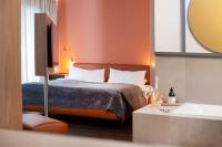 Posteľ alebo postele v izbe v ubytovaní hirschen dornbirn - das boutiquestyle hotel