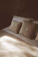 A bed or beds in a room at Trulli Difesa