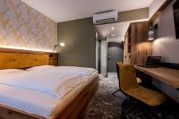 Sleep in Premium Hotel Eggenburg&#x623F;&#x9593;&#x7684;&#x5E8A;