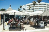 A restaurant or other place to eat at New Beachfront Loft