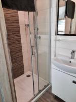 Koupelna v ubytování Apartament Jastarnia