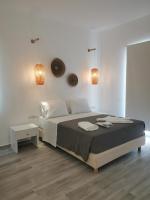 Postel nebo postele na pokoji v ubytování Galazio Rooms & Suites