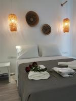 Postel nebo postele na pokoji v ubytování Galazio Rooms & Suites