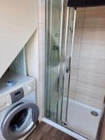 Koupelna v ubytování Apartament Jastarnia