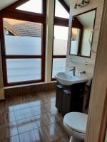 Koupelna v ubytování Apartament Jastarnia