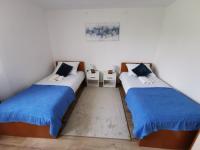 Postel nebo postele na pokoji v ubytování Studio apartman Krosna