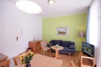 TV a/nebo společenská místnost v ubytování Villa Hans by Rujana