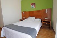 Postel nebo postele na pokoji v ubytování Villa de Colunga