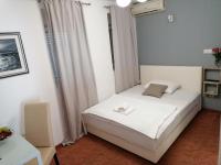 Posteľ alebo postele v izbe v ubytovaní Hotel Garny Pleso