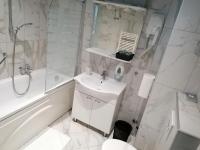 Kúpeľňa v ubytovaní Hotel Garny Pleso