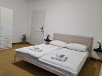 Posteľ alebo postele v izbe v ubytovaní Hotel Garny Pleso