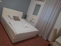 Posteľ alebo postele v izbe v ubytovaní Hotel Garny Pleso