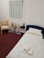 Posteľ alebo postele v izbe v ubytovaní Hotel Garny Pleso