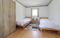 Łóżko lub łóżka w pokoju w obiekcie Ferienhaus In Schlierbach