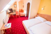 Telewizja i/lub zestaw kina domowego w obiekcie Hotel Weissenstein