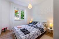 Posteľ alebo postele v izbe v ubytovaní Apartments in Dramalj 39504