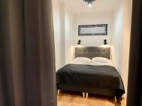 Posteľ alebo postele v izbe v ubytovaní Petite Viste No. 3 Apartment