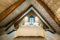 Postel nebo postele na pokoji v ubytování RESORT KOVÁRNA - Frýdštejn - stylové ubytování, luxusní wellness, zážitková restaurace