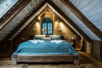 Postel nebo postele na pokoji v ubytování RESORT KOVÁRNA - Frýdštejn - stylové ubytování, luxusní wellness, zážitková restaurace