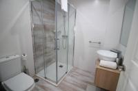 Koupelna v ubytování GLORIA SUITES