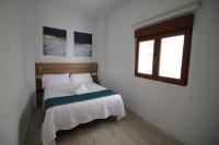Postel nebo postele na pokoji v ubytování GLORIA SUITES