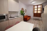 Kuchyň nebo kuchyňský kout v ubytování GLORIA SUITES
