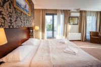 Posteľ alebo postele v izbe v ubytovaní Hotel Kuracyjny Spa & Wellness