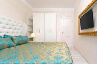 Postel nebo postele na pokoji v ubytování Harmony Suites Saint Vlas