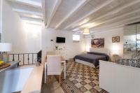 Posteľ alebo postele v izbe v ubytovaní Casa Talete Cozy Apartment in Ortigia - FIRST FLOOR