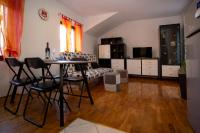 Televízia a/alebo spoločenská miestnosť v ubytovaní Apartment Kika